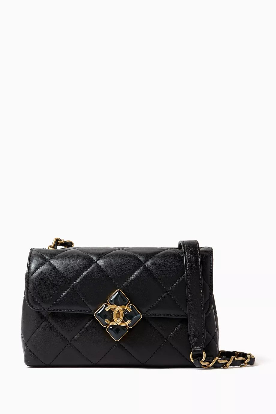 حقيبة مبطن بنقشة معينات وغطاء قلاب جلد ماعز